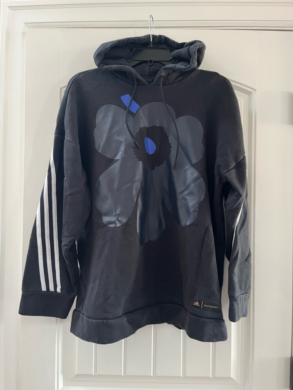 Adidas women’s Black Hoodie Sweatshirt with Marimekko Floral Graphic.